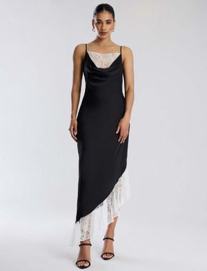 VESTIDO LARGO ASIMÉTRICO DESBOCADO CON ENCAJE CONTRASTE