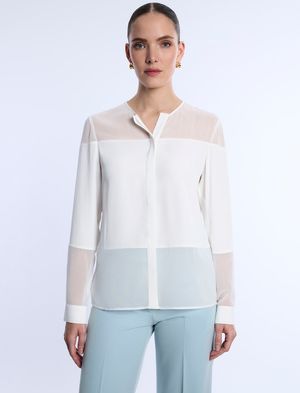 BLUSA PANELES TRANSPARENCIA ESTRATÉGICA MANGA LARGA