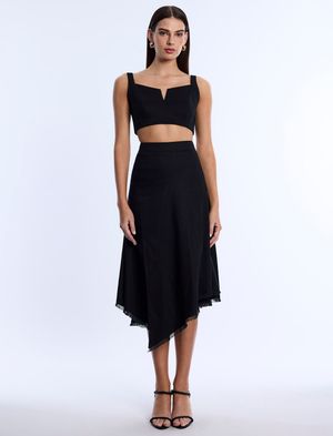 FALDA MIDI ASIMÉTRICA CON ABERTURA TERMINADA CON CHIFFON